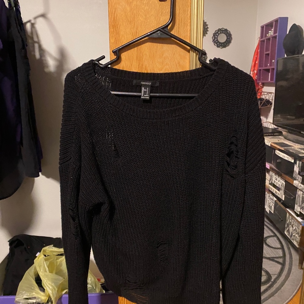 Tattered sweater